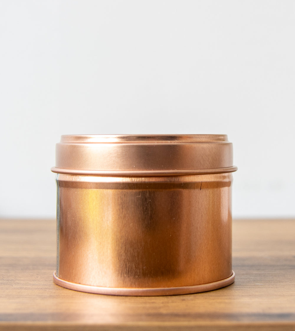 100g white label candle tin in rose gold