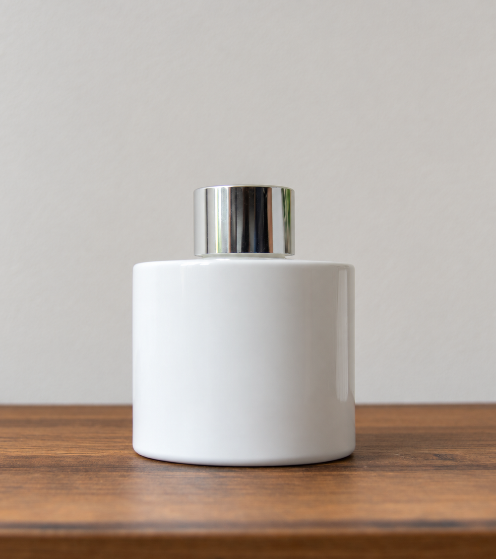 Reed diffuser bottle with silver cap in White Gloss